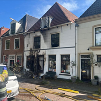 Veel schade door brand bij boekhandel Pezzi Pazzi